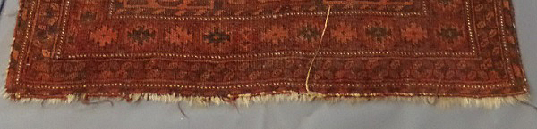 damaged rug end